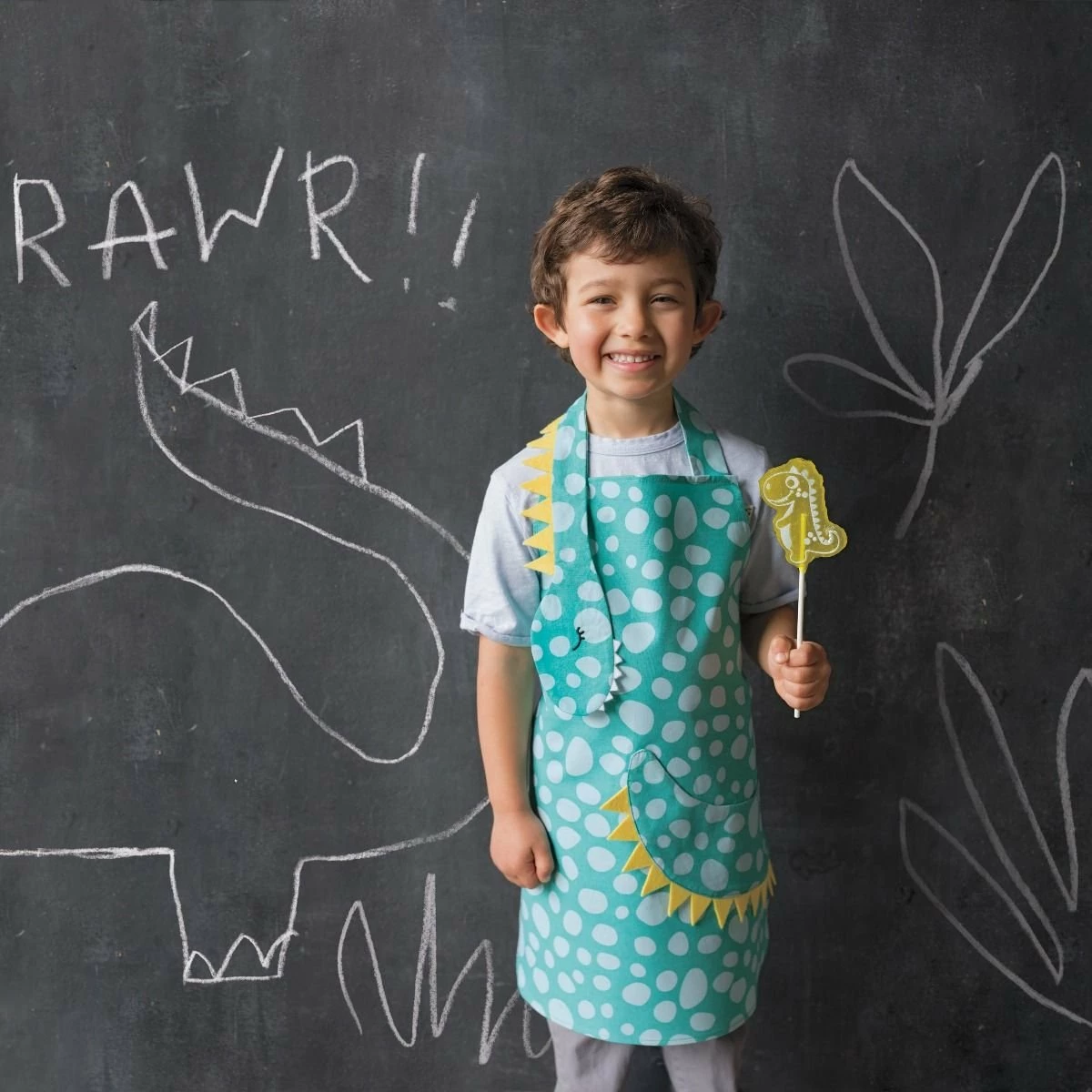 Now Designs Danica Jubilee Kid's Apron | Dino Daydream 6 Now Designs Danica Jubilee Kid's Apron | Dino Daydream - Image 4