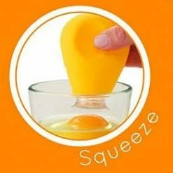 Tovolo Yolk-Out(TM) Egg Yolk Separator - Silicone -Curious Shop tovolo yolkout1 81 3194